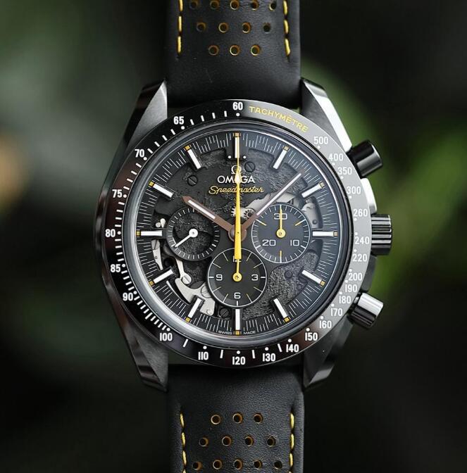 The yellow second hand is striking on the black uneven dial.